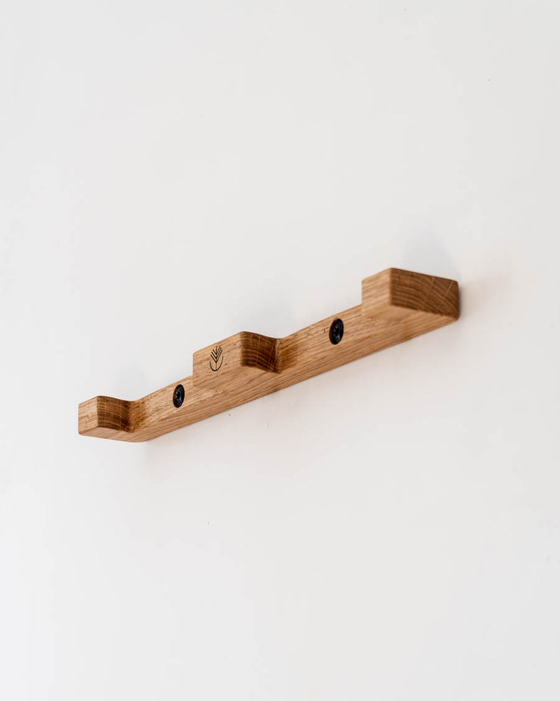 Support mural en bois pour paire de skis