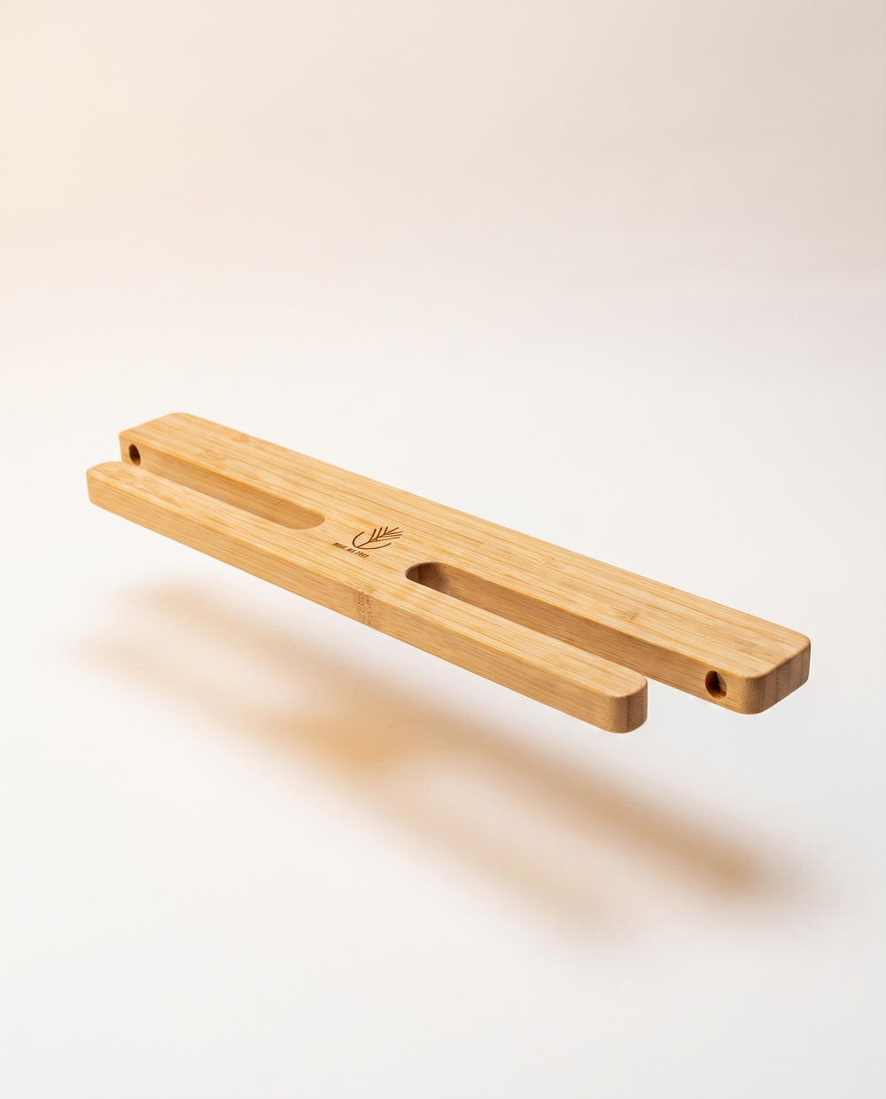 Bamboo double skateboard wall mount, floating detail view
