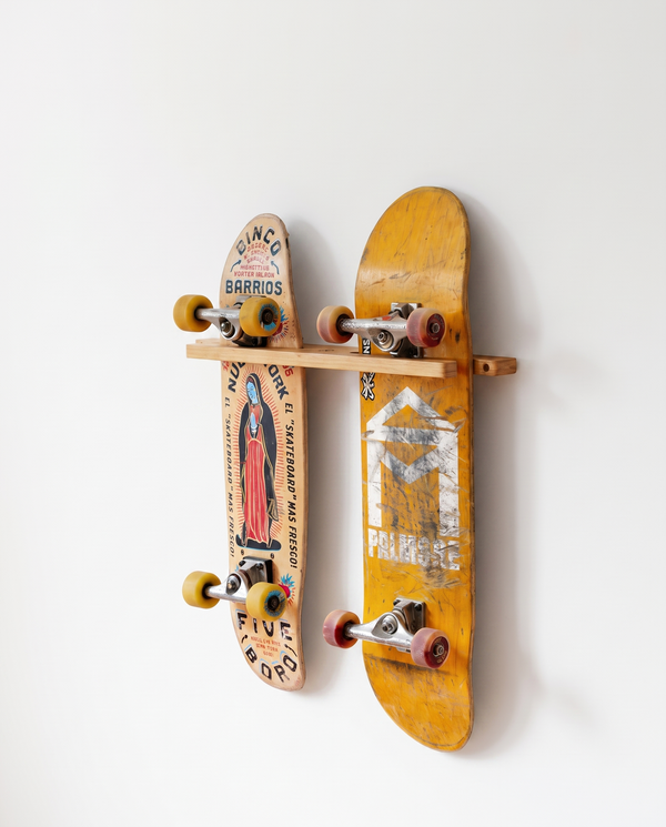 Bamboo double vertical skateboard wall mount holding two skateboards