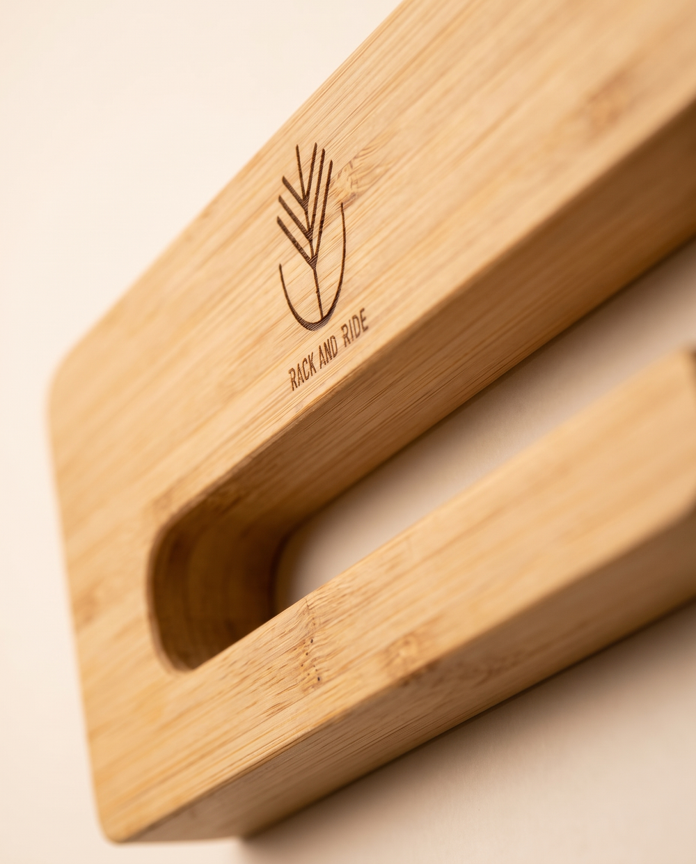Close-up of the bamboo grain of a Rack and Ride vertical skateboard wall mount