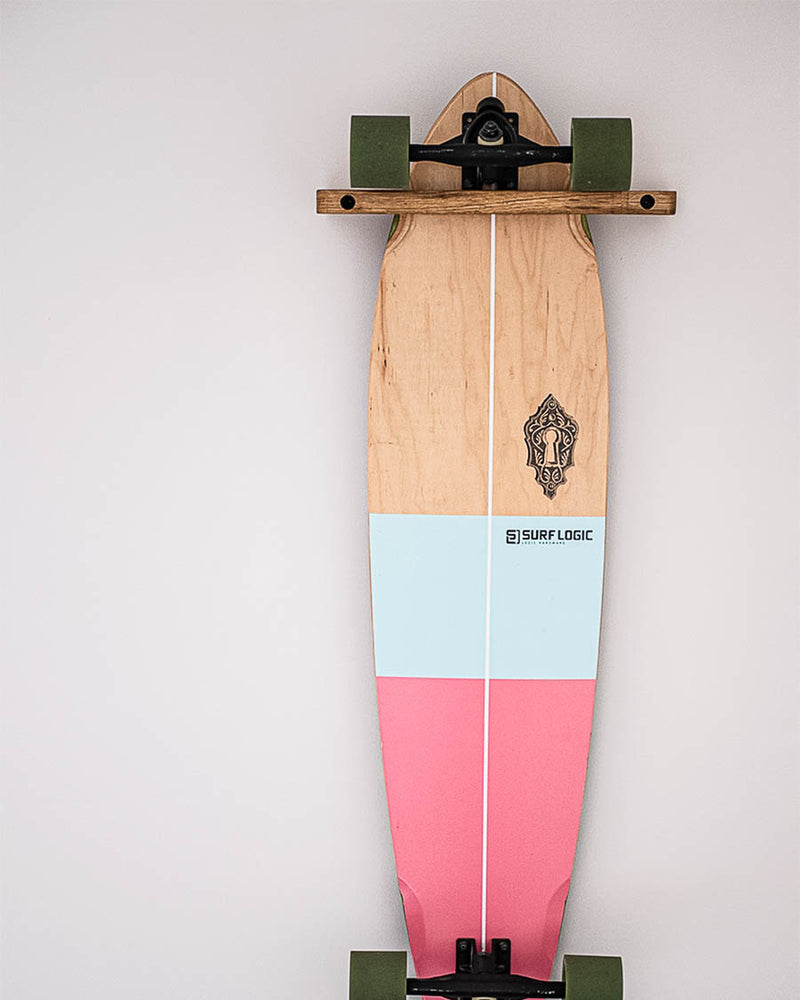 Oak vertical wall mount displaying a longboard against the wall